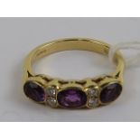 An 18ct gold amethyst and diamond ring,