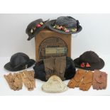 A quantity of vintage ladies clothing; four hats, silk and gilt metal evening purse,