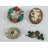Four brooches; an enamelled HM silver clover brooch, a HM silver Scottish hardstone brooch,