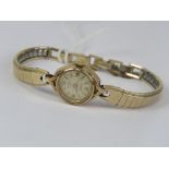 A 9ct gold ladies manual wind Rotary cocktail watch having cream dial with yellow metal hands and