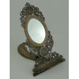 A delightful fretted ladies easel mirror having floral inlaid decoration, 40cm in length.