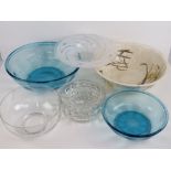 A quantity of glassware including two aqua blue bowls, pressed glass fruit bowl, plain mixing bowl,