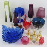 A quantity of assorted coloured glassware including layered glass vase, heavy art glass bowl,