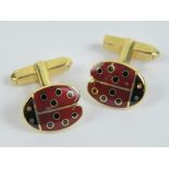 A pair of 18ct gold enamelled cufflinks in the form of ladybirds, hallmarked 750, 15.9g.