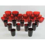 A quantity of eleven (10 + 1) ruby glass tumblers, together with sixteen ruby glass bowls,