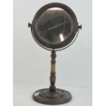 A late 19th/early 20th century double sided gentlemans shaving mirror,