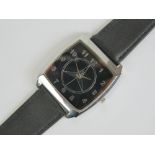 A contemporary Mercedes themed gentlemans wristwatch, having square shaped chromium watch head,