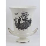 A Wedgwood Etruria two handled table centrepiece decorated with Asiatic Pheasants upon, 25cm high,
