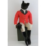 Mr Fox the Huntsman; a seated soft toy fox dressed in hunting pink complete with whip and boots,
