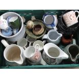 A quantity of assorted contemporary stoneware jugs and bowls.
