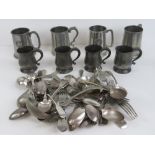 Four Victorian half pint pewter flagons, together with four 20th century pewter flagons,
