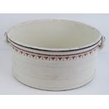 A 19th century Wedgwood ceramic foot bath having end handles and banded design, 22cm high,