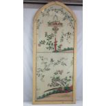 An Oriental famille rose needlework in arch top frame depicting a basket of fruit and flowers with