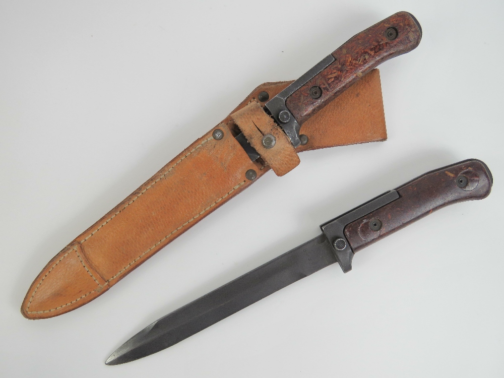 Two CV58 bayonets one with scabbard, one