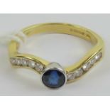 An 18ct gold sapphire and diamond ring,