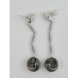 A pair of 18ct white gold earrings havin