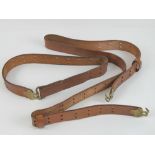 A US Military Springfield / M1 Garand rifle brown leather adjustable sling.