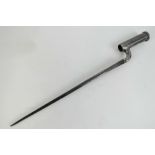 A British and Colonial Military issue Martin Henry triangle bladed early pattern socket bayonet