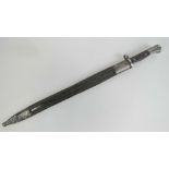 A WWI era Venezuelan / Spanish 17" Mauser bayonet, in leather scabbard dated 1915.