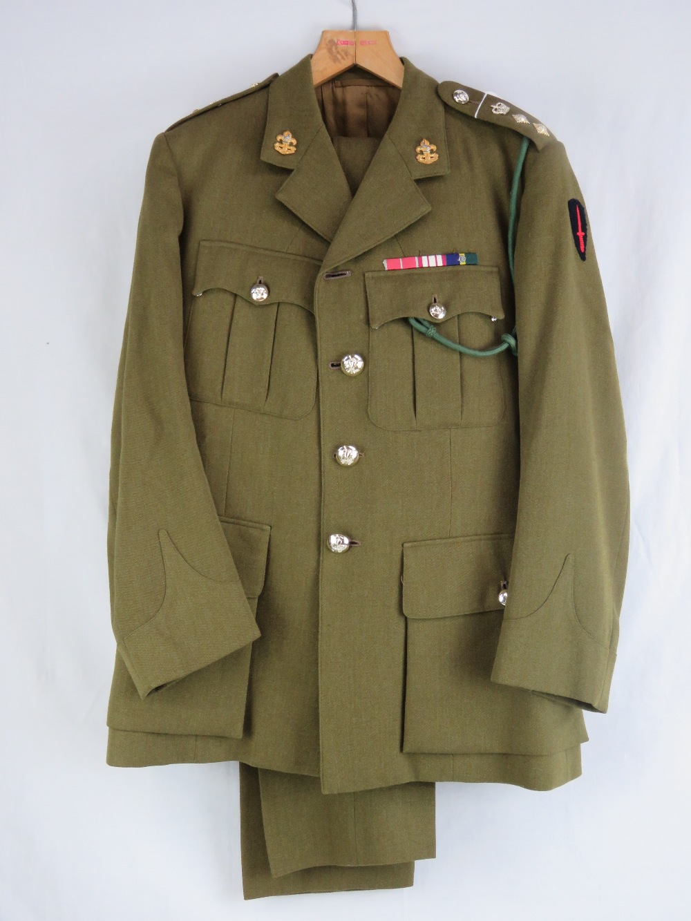 A British Military Officers No2 dress uniform having Kings regimental badges upon,