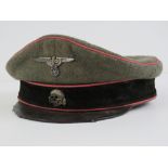 A WWII SS Panzer Officers 'Crusher' peaked cap, with Makers label upon.
