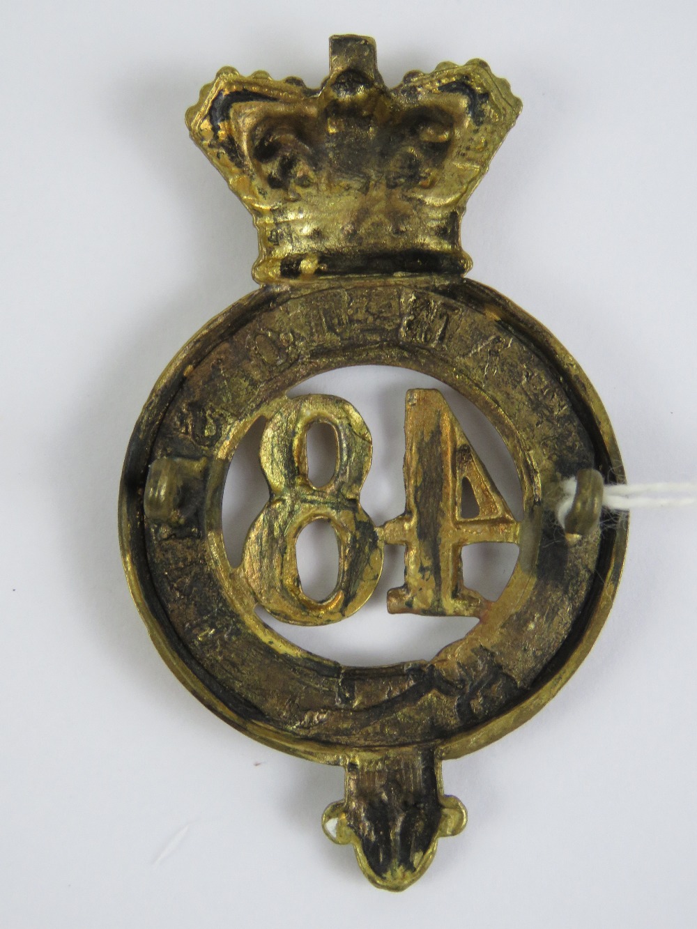 A British 48th Regiment Glengarry badge, Northamptonshire Regiment, measuring 7cm high. - Image 2 of 2