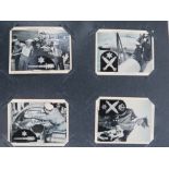 A collection of military themed 'The Navy at Work' cigarette cards by Churchmans within vintage