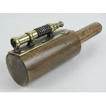 A vintage home made trench type hand held wooden and brass 'cannonade',