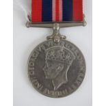 A WWII British War medal 1939-1945 with ribbon.