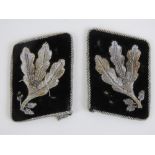 A pair of WWII German SS Generals (SS Grupenfuhrer) silver thread collar patches.