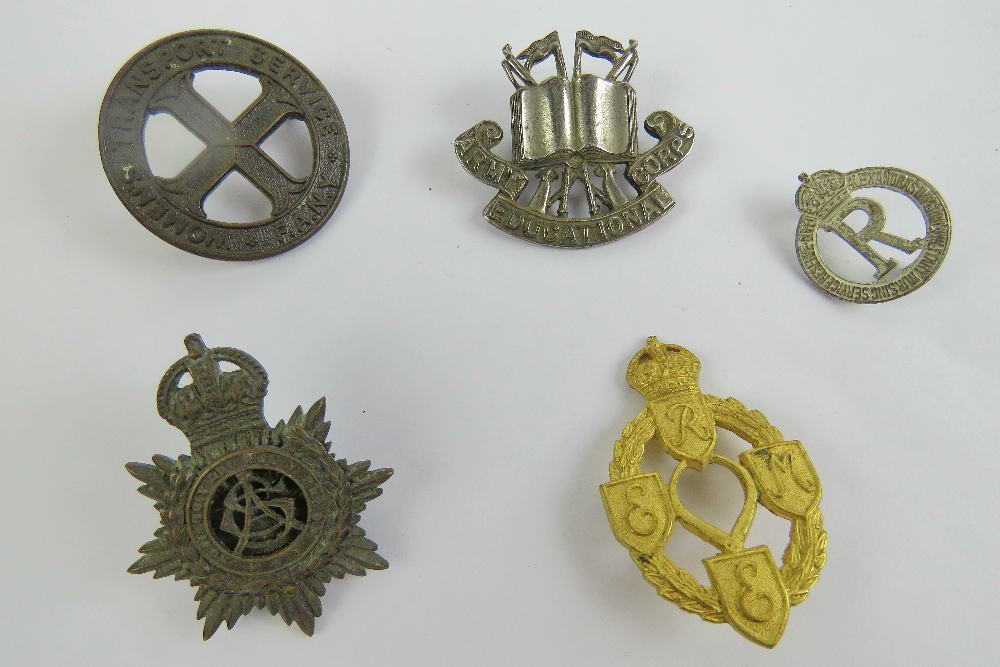 Five assorted officer's badges including Army Educational Corp, Women's Transport Service, etc.