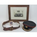 A leather Sam Brown belt, a Royal Engineer's Captains peak cap with gold thread peak,