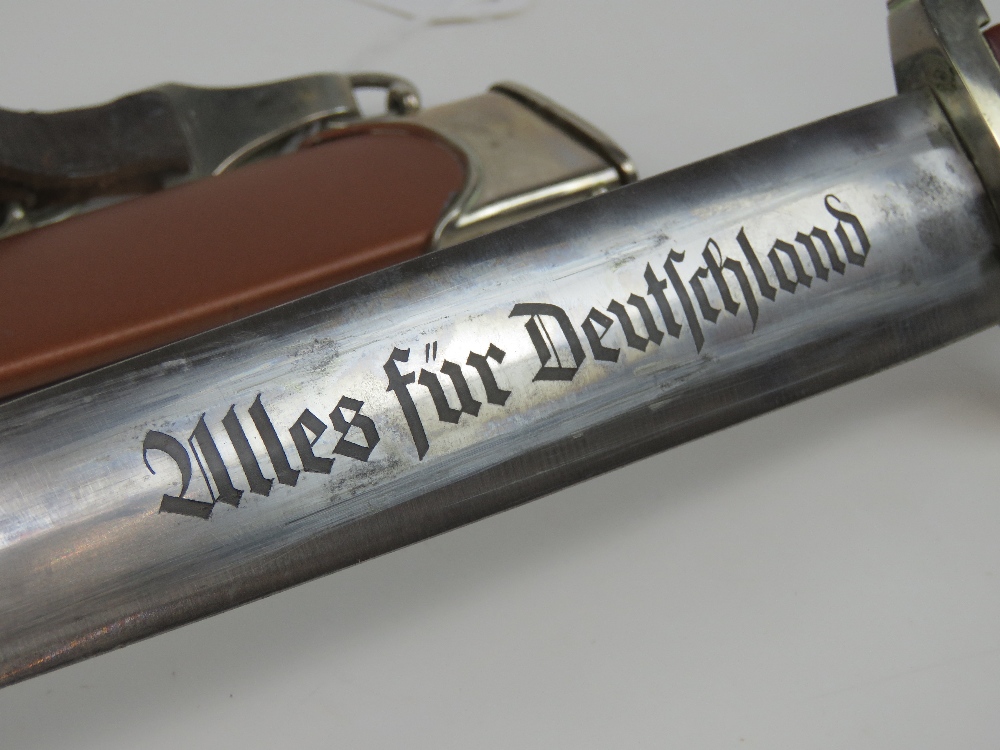 A WWII German SA dagger inscribed 'Alles Fur Deutschland' with Carl Schmidt Sohn A-G Solingen - Image 3 of 5