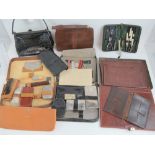 A quantity of vintage ladies handbags, leather wallet, vanity case, conference wallet etc.