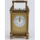 A superb and heavy gilt brass architectural five glass carriage clock,