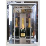 A contemporary illuminated Krug champagne bar display complete with Krug Brut Grant Cuvee display