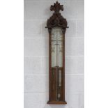 A 19th century carved oak Admiral Fitzroy's barometer.