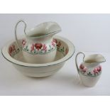 A Sorne and Smith wash jug and bowl together with a smaller jug. Three items.