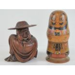A vintage hand painted wooden Babooska depicting an angry Samurai warrior, Height 18cm.