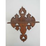 A Gothic revival hall shelf having pierced trefoil decoration and measuring 24cm in width.