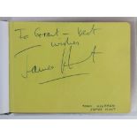 An autograph book containing a number of F1 racing driver and team member signatures to include;