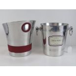 Two Laurent Perrier champagne ice buckets.