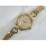 A vintage Garrard 9ct gold ladies manual wristwatch,