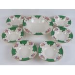 A Hoult & Co Sandringham pattern large dessert bowl with six matching small bowls all in a floral