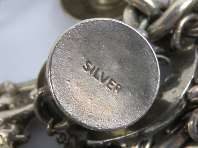 An HM silver curb link charm bracelet having heart padlock clasp and assorted silver and white - Image 4 of 4