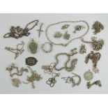 A quantity of assorted silver and white metal jewellery including a sterling silver locket,