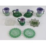 A quantity of Scottish thistle related items; graduated jugs, pair of candlesticks,