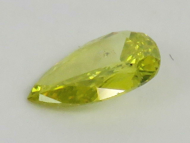 A 0.5ct canary yellow pear cut diamond, loose in protective case. - Image 3 of 3