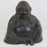 A vintage moulded brass seated Buddha figurine, 13cm high,