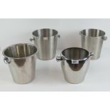 Four unbranded metal champagne ice buckets.